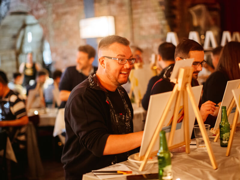 man at a paint and sip